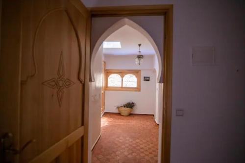 Un ou plusieurs lits dans un hébergement de l'établissement Dar YAMINA SUIKA