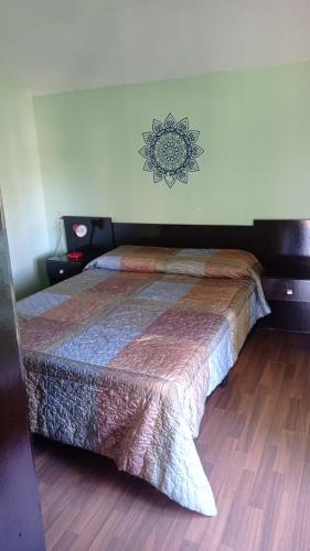 a bedroom with a bed in a room at El despertar in Piriápolis