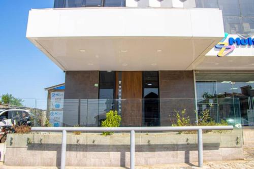 a building with a ramp in front of it at Venue 360 in Freetown