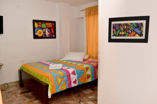 Postel nebo postele na pokoji v ubytování Hotel Castillo Real