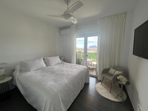Postel nebo postele na pokoji v ubytování Tosca Mar Penthouse