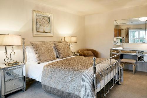 Postel nebo postele na pokoji v ubytování Cheriton Cottage