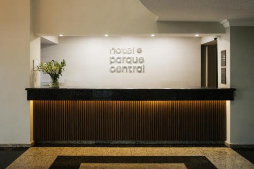 a lobby with a sign that reads food service center at Hotel Parque Central in Monterrey