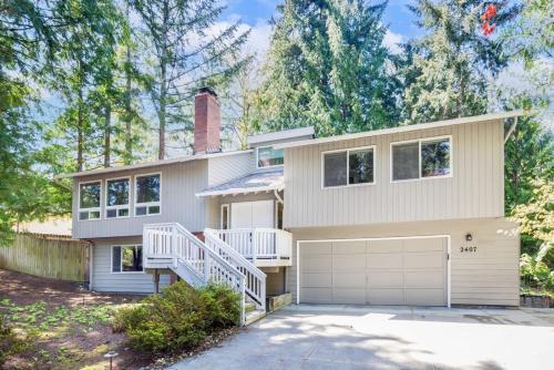 a house with a staircase and a garage at Multi functional Family Home in Redmond and only four mins to MSFT in Redmond