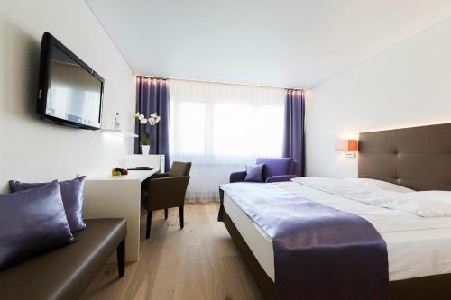 Postel nebo postele na pokoji v ubytování Hotel Al Ponte