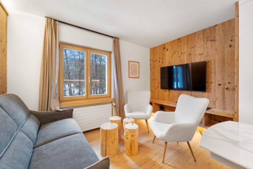 TV a/nebo společenská místnost v ubytování Luxury Apartment St Moritz