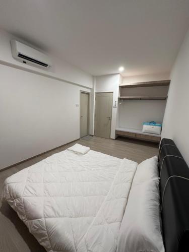 Postel nebo postele na pokoji v ubytování GTR Staycation - DMillenia Residence