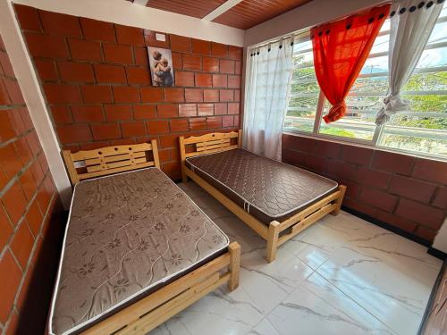 Postel nebo postele na pokoji v ubytování Apartamento Piso 2 Casa 5 Hotel Atlantis Libano