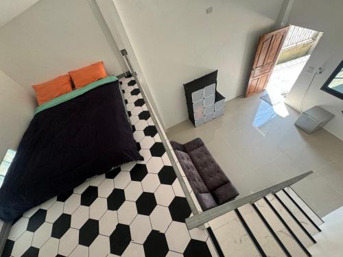 Ένα ή περισσότερα κρεβάτια σε δωμάτιο στο The home stay 1