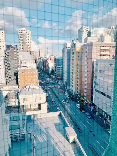 Shinjuku Kabuki Youth Hostel#New Sunshine Room#50 second walk from Higashi Shinjuku subway#Automatic locking door at entrance#新宿2