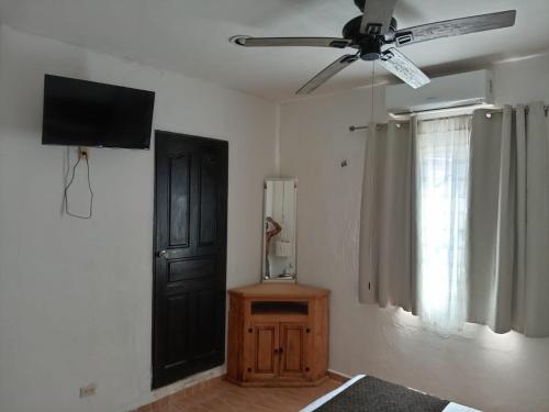 TV a/nebo společenská místnost v ubytování Casa iguana-home away