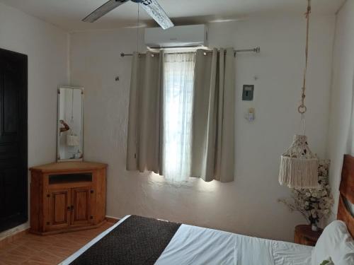 Postel nebo postele na pokoji v ubytování Casa iguana-home away