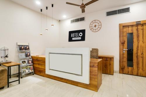 TV a/nebo společenská místnost v ubytování Super Hotel O Pardi Near Kalamna Market