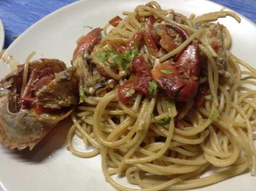 a white plate of pasta with meat and sauce at Gaarawe, Khao Sok, Surat Thani Province, Thailande in Ban Bencha