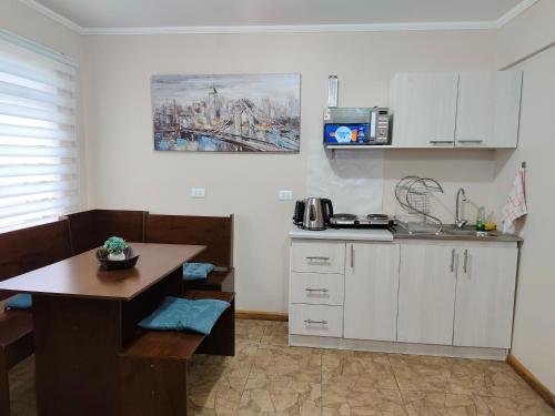 Kuchyň nebo kuchyňský kout v ubytování Departamentos Entre Lagos