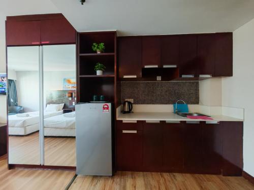 Katil atau katil-katil dalam bilik di Meetsuite at Ming Garden Residence