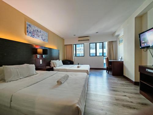 Katil atau katil-katil dalam bilik di Meetsuite at Ming Garden Residence