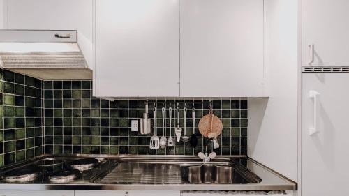 Kuchyň nebo kuchyňský kout v ubytování Superb Modern Studio Leukerbad