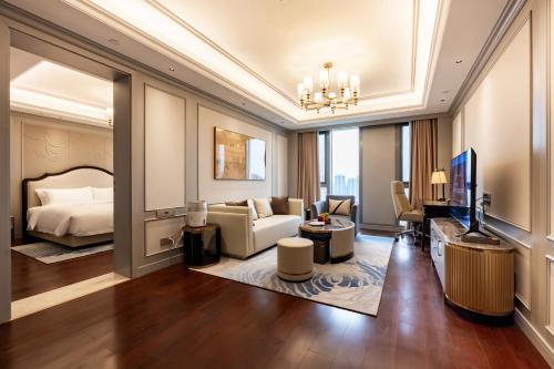 Posezení v ubytování Jian Guo Hotel Yantai Phoenix Building
