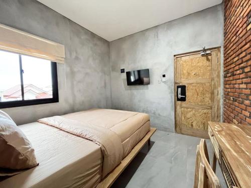 Postel nebo postele na pokoji v ubytování Rattanhaus Premiere