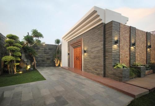Zahrada ubytování Anukula Villa, A Luxury 4-BR Private Pool Villa in Kemenuh Ubud