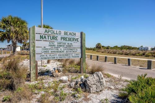a sign for a wildlife preserve on the side of a road at Updated Waterfront Condo in Apollo Beach in Apollo Beach