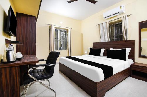 TV a/nebo společenská místnost v ubytování Super Hotel O Indira Park Road Bhubaneswar