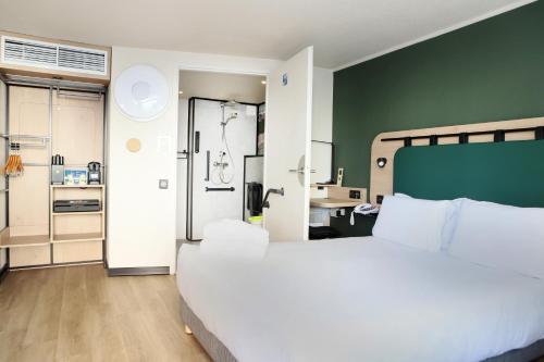 Letto o letti in una camera di Campanile Toulouse Balma - Cité de l'Espace
