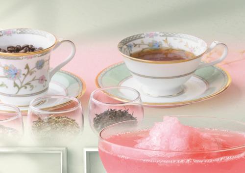 a table with cups of tea and a bowl of sugar at Hotel Monterey Okinawa Spa & Resort in Onna