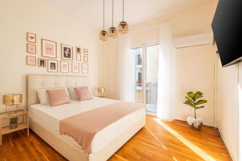 Postel nebo postele na pokoji v ubytování Emilia Athens