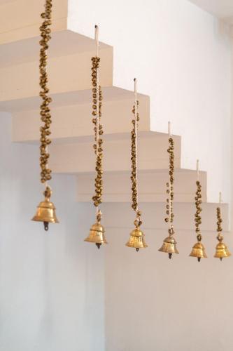 a chandelier hanging from a ceiling at Gopagiri Homestay - Gwalior in Gwalior