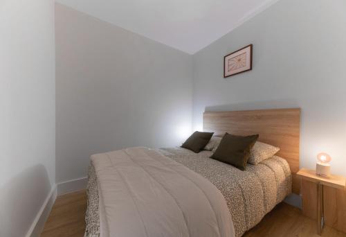 Postel nebo postele na pokoji v ubytování Résidence Desroziers - Appartements design en centre ville