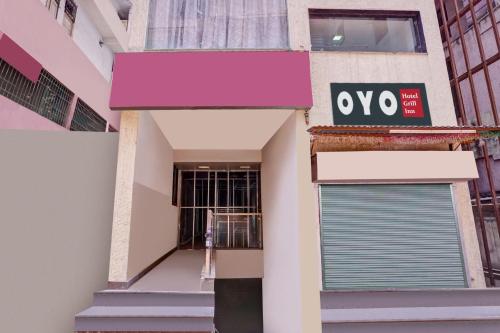 aiya sign on the side of a building at Super Hotel O Grill Inn in Dhanbād