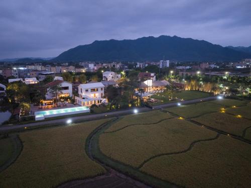an aerial view of a city at night at Sanhe Daoli Resort in Qingyuan