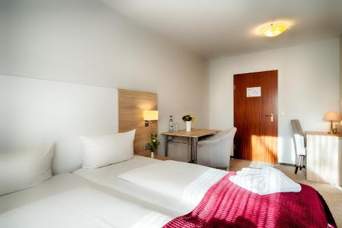 Hotel Frieslandにあるベッド