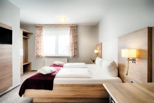 Hotel Frieslandにあるベッド