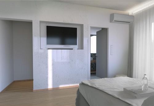 Μια τηλεόραση ή/και κέντρο ψυχαγωγίας στο Villa Heora - The Floating Residence