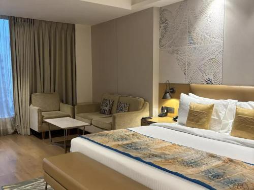 Cama o camas de una habitación en Sayaji Jamnagar