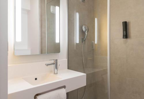 Ένα μπάνιο στο B&B HOTEL Villefranche-sur-Saône Sud