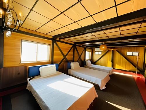 Postel nebo postele na pokoji v ubytování HOTEL COCOA RESORT