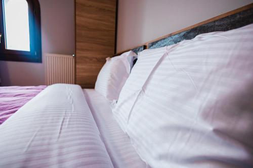 Guesthouse Pezodromosにあるベッド