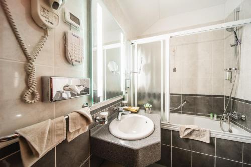 Koupelna v ubytování Boutique Hotel Kazbek
