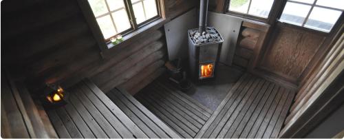 an overhead view of a room with wooden walls and windows at Amazing Home In Sälen With 5 Bedrooms, Sauna And Wifi in Sälen
