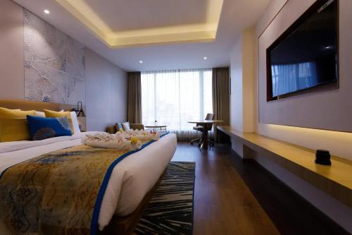 Cama o camas de una habitación en Sayaji Jamnagar