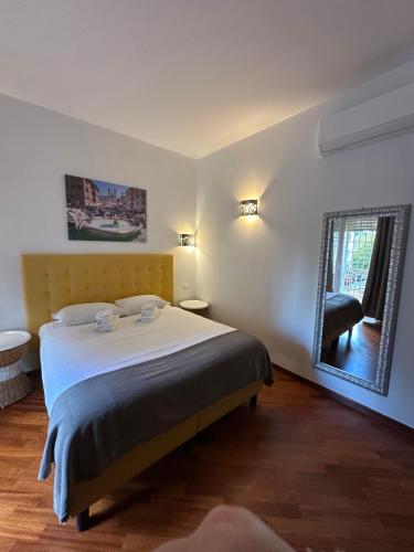 Voodi või voodid majutusasutuse Vatican QG Rooms toas