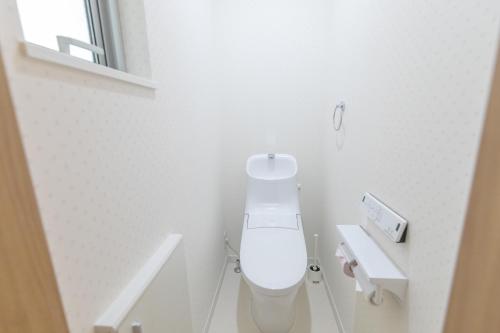 Koupelna v ubytování 住舎上新庄