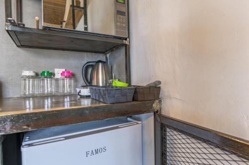 a kitchen with a counter top and a dishwasher at Villagio Resort in Zaarour in Zaarour