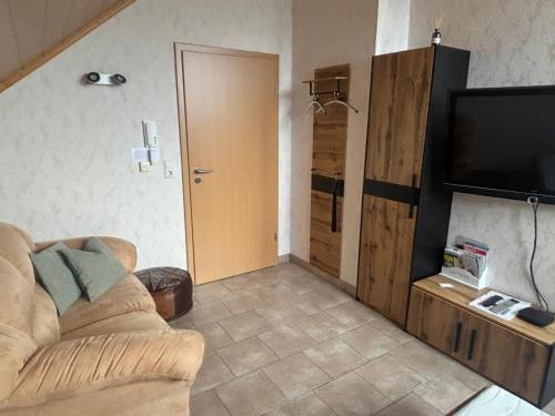TV a/nebo společenská místnost v ubytování Apartment in Stauseenähe