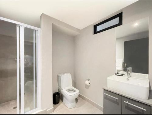 Ένα μπάνιο στο Circa Aparthotel by unit 187