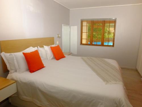 Ένα ή περισσότερα κρεβάτια σε δωμάτιο στο Lauradale Accommodation